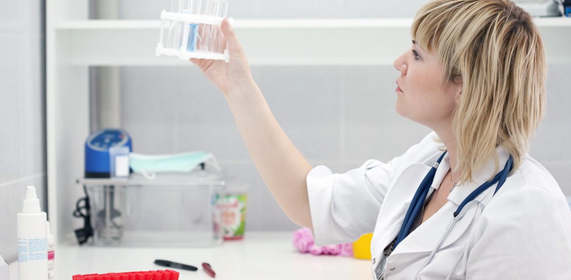 doctor checking vials