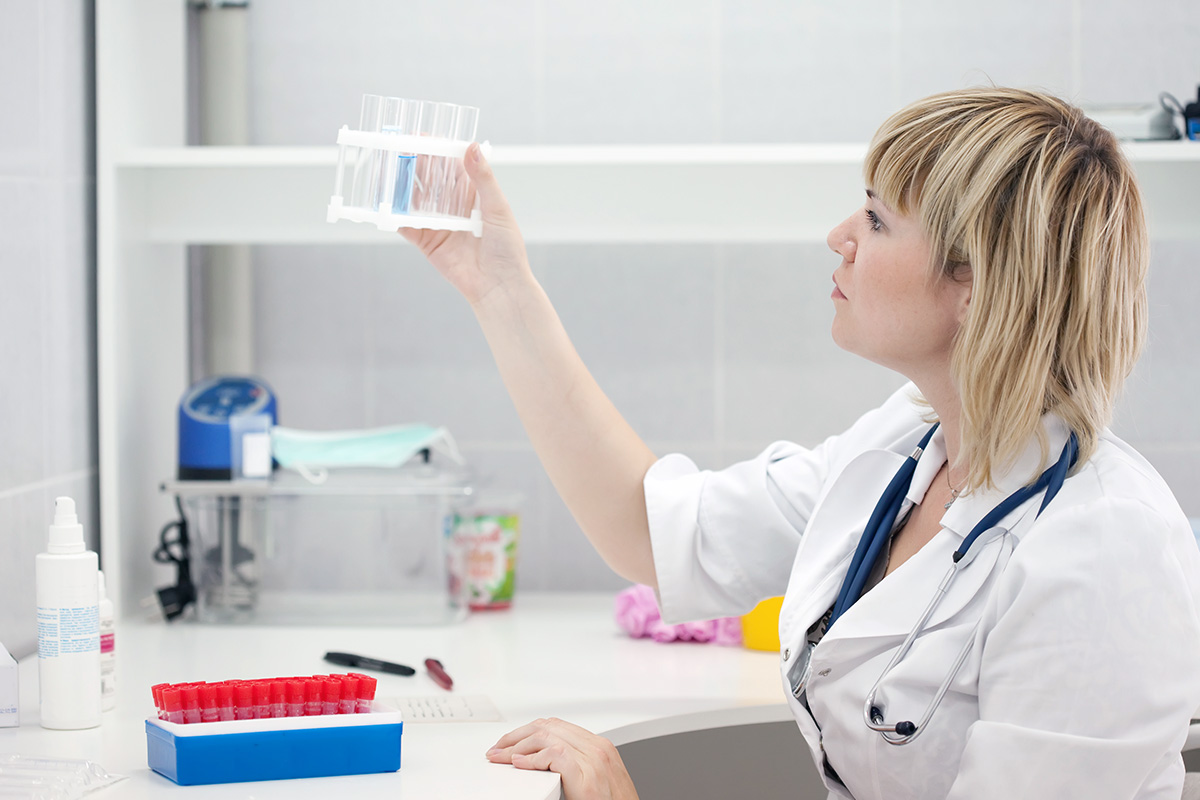 doctor checking vials